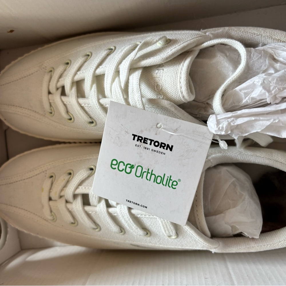 Brand new white Tretorns, with tags still in box size 9